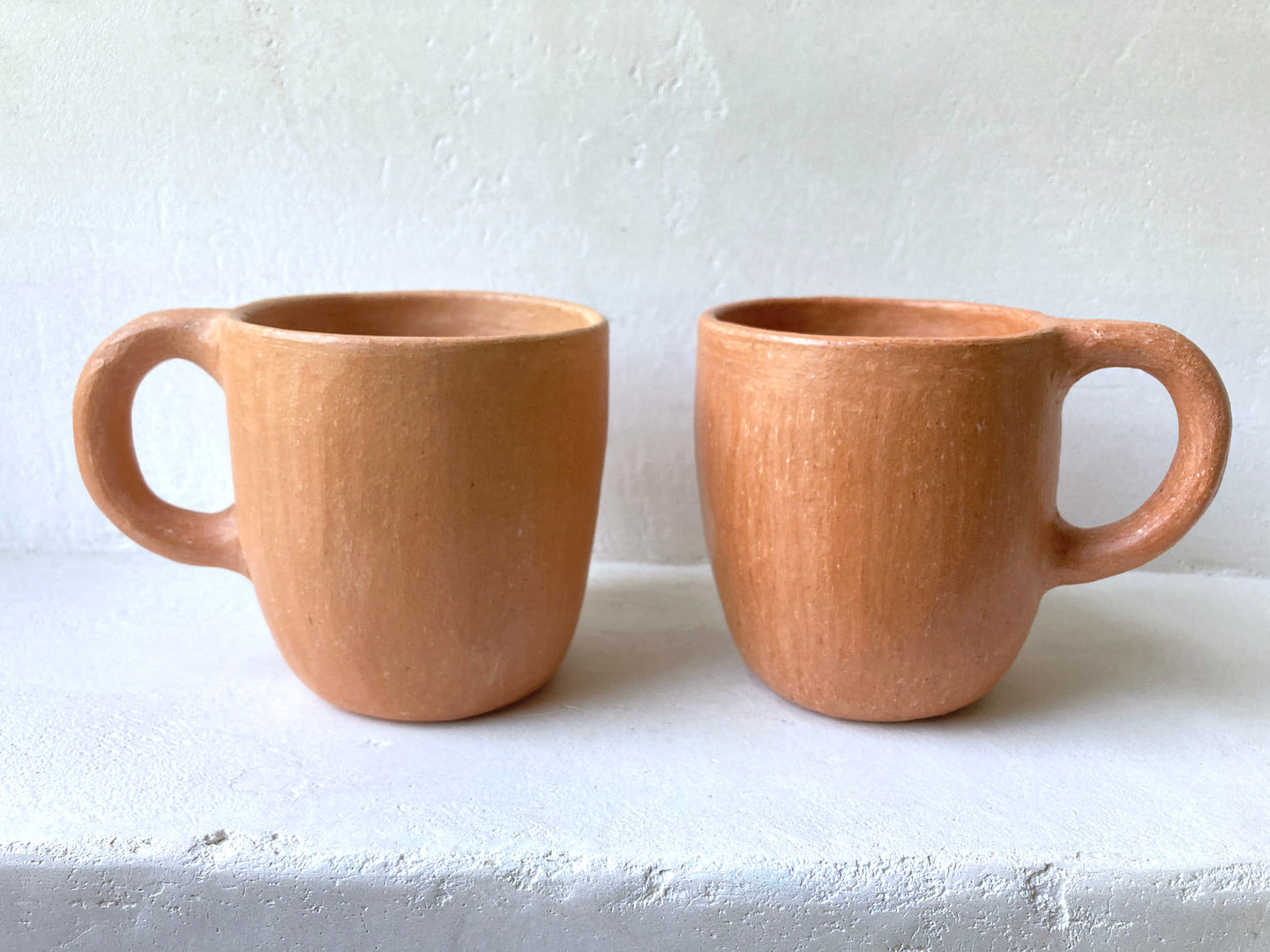 Pair of terracotta cups