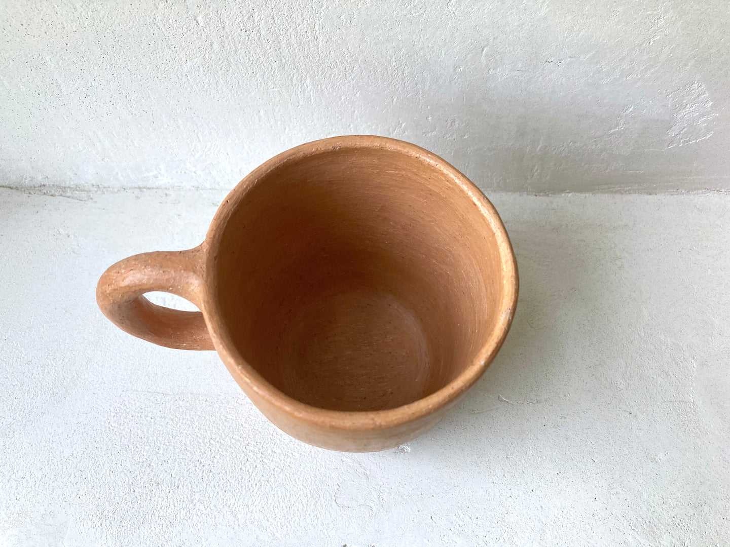 Pair of terracotta cups, detail
